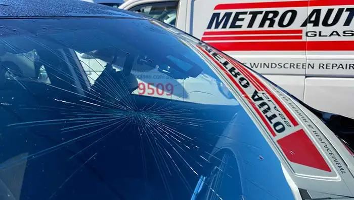 Cracked windscreen on a car before replacement